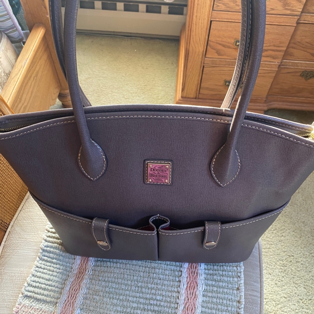 Dooney and Bourke brand new never used